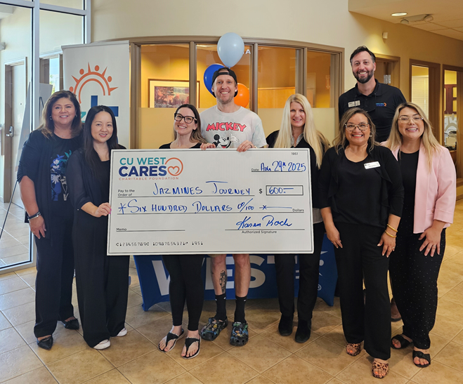 Web Ops Director Nina Rocket and Creative Director Johnny Grenz stand with Credit Union West executives and staff holding a large $600 check